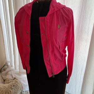 Juicy couture pink nylon wind breaker jacket sized medium with 2 pockets